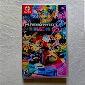 Nintendo Switch lite with portable holder and charger comes with Mario Game